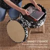 Taburet cu depozitare Navaris, imprimeu cow print, 35x35x42 cm, capac capitonat, alb/negru, plastic
